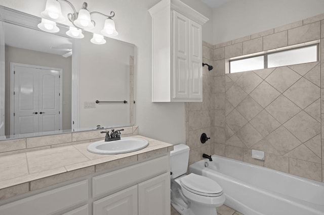 full bathroom with shower / bathtub combination, vanity, and toilet