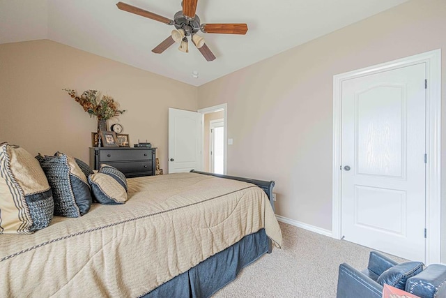 bedroom with carpet floors, ceiling fan, and lofted ceiling