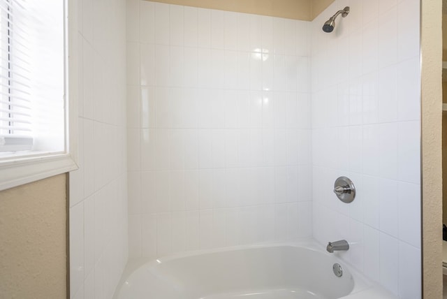 full bath featuring shower / tub combination