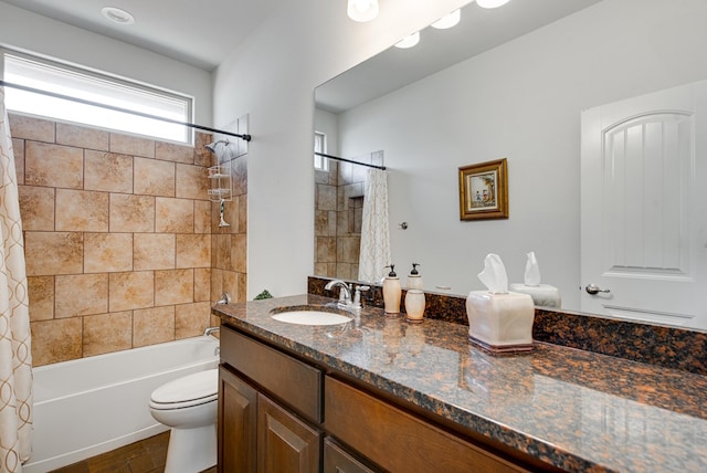 bathroom with toilet, shower / bathtub combination with curtain, and vanity