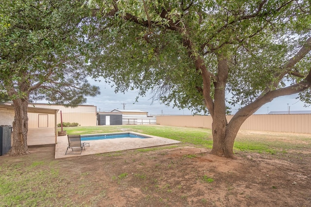 10807 E County Rd 104, Midland, TX 79706 - fenced backyard featuring a patio area and a shed