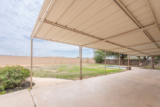 10807 E County Rd 104, Midland, TX 79706 - fenced backyard with a patio