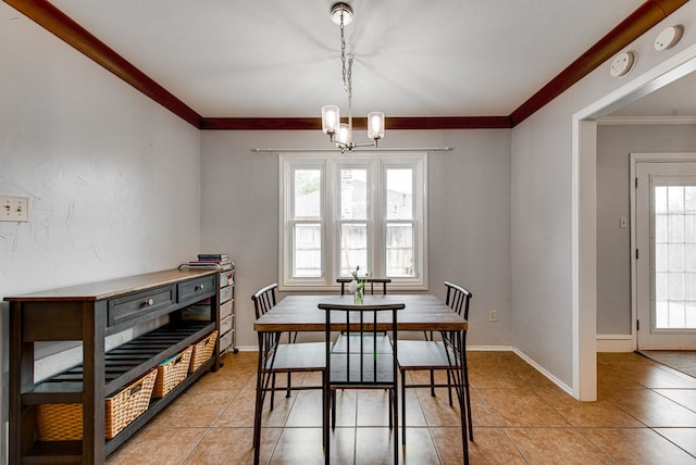 dining area with an inviting chandelier, light tile patterned flooring, crown molding, and plenty of natural light