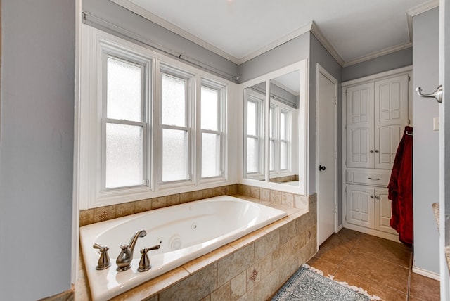 full bathroom with a jetted tub, ornamental molding, tile patterned flooring, and plenty of natural light