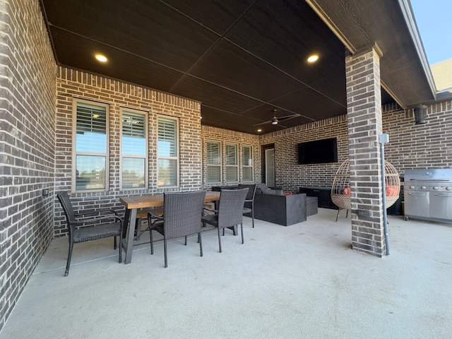 view of patio featuring ceiling fan, a grill, and outdoor lounge area