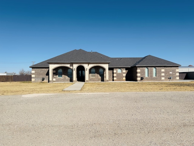 view of front of house with a front lawn