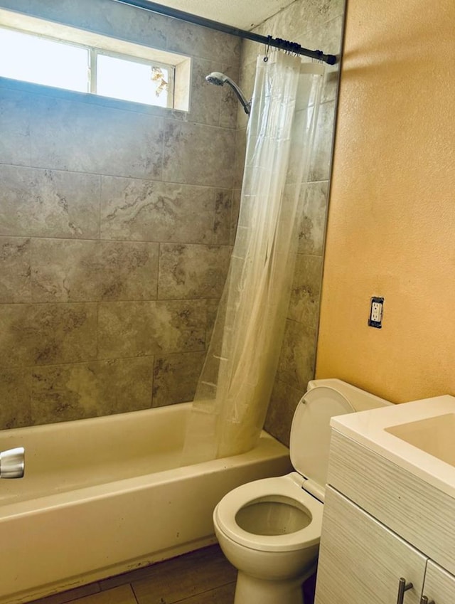 full bathroom with shower / bath combination with curtain, vanity, toilet, and hardwood / wood-style floors