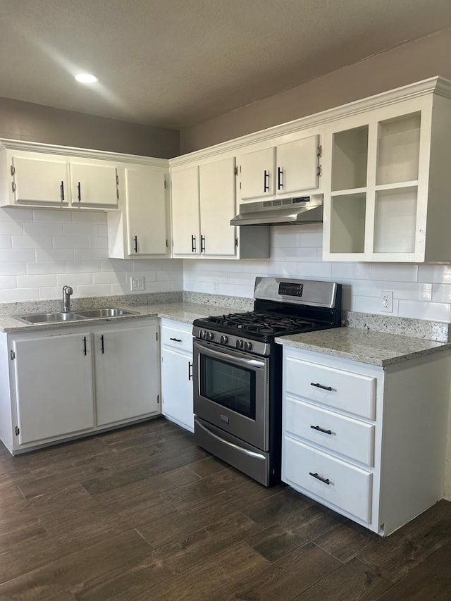 kitchen featuring white cabinetry, stainless steel range with gas stovetop, and sink