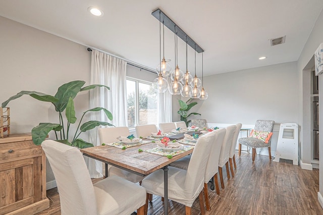 dining area featuring recessed lighting, dark wood-style flooring, and visible vents