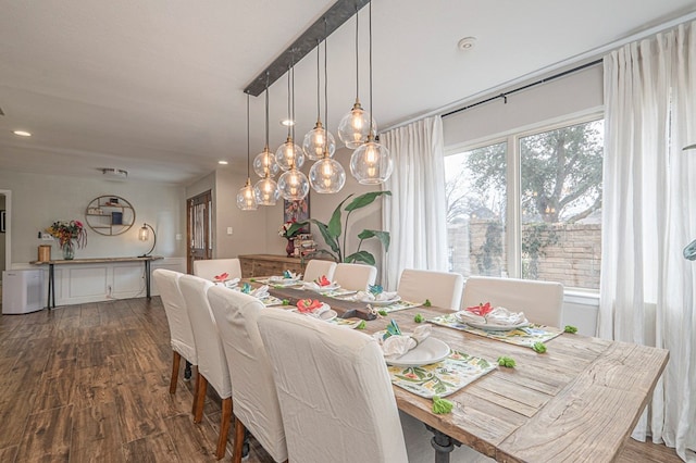 dining area with dark wood-style floors