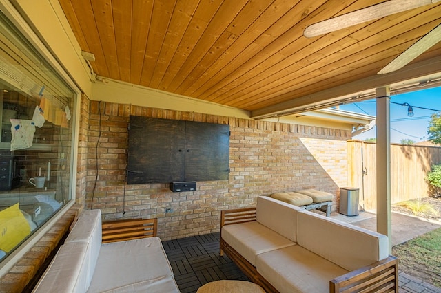 view of patio / terrace with fence and an outdoor hangout area