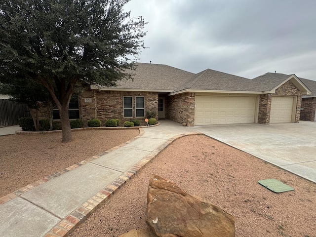 single story home featuring a garage