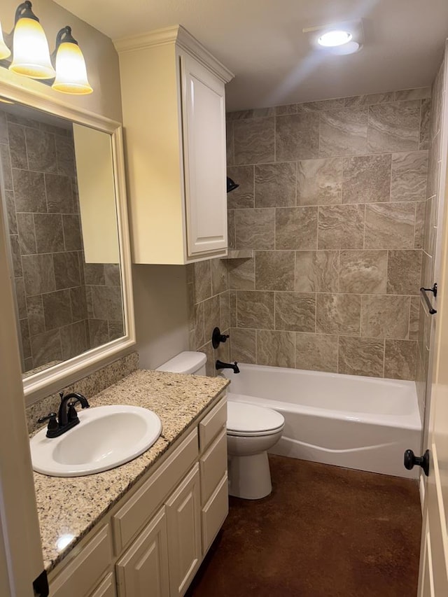 full bathroom with vanity, toilet, and tiled shower / bath combo