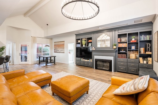 living room featuring wood-type flooring, beam ceiling, and high vaulted ceiling