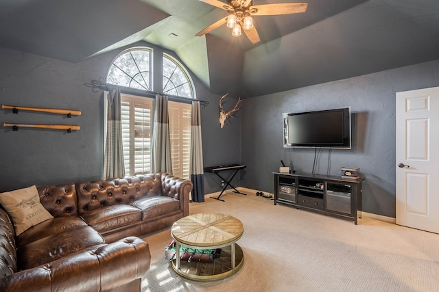 carpeted living room with vaulted ceiling and ceiling fan