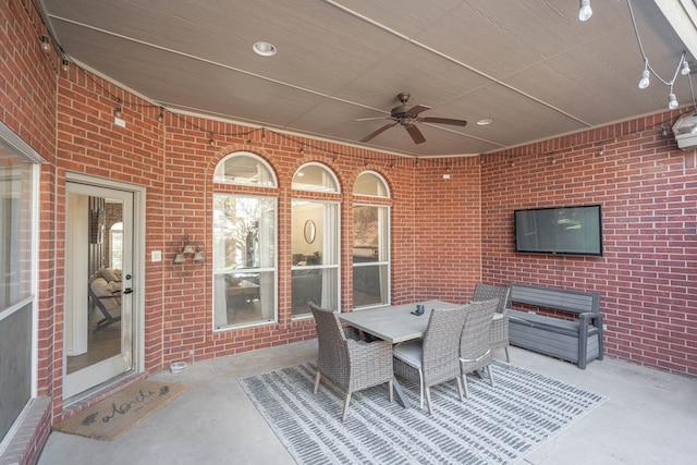 view of patio / terrace featuring ceiling fan