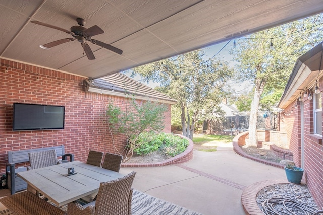 view of patio / terrace featuring ceiling fan