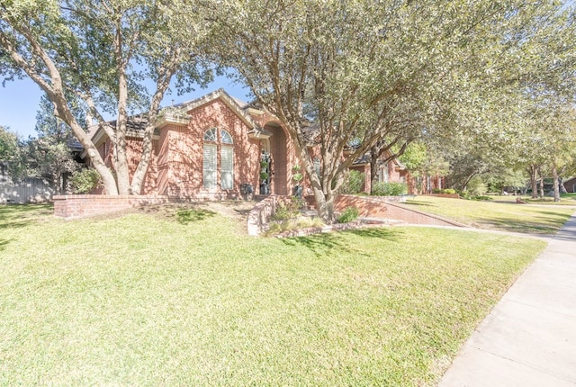 view of front of house with a front yard