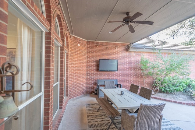 view of patio / terrace featuring ceiling fan