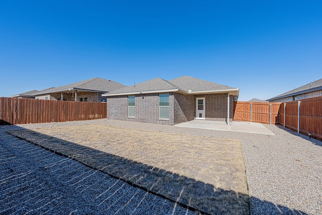 back of house featuring a patio area