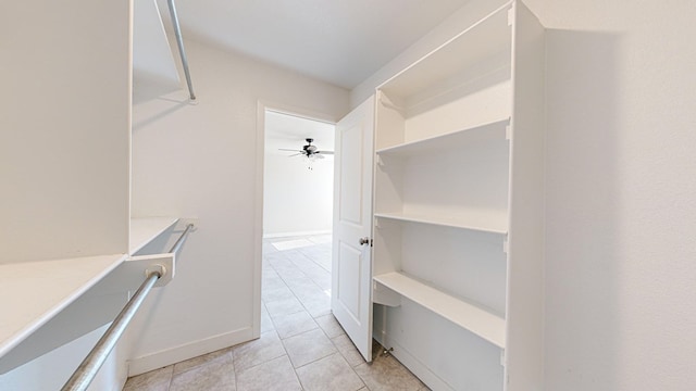 walk in closet featuring light tile patterned floors