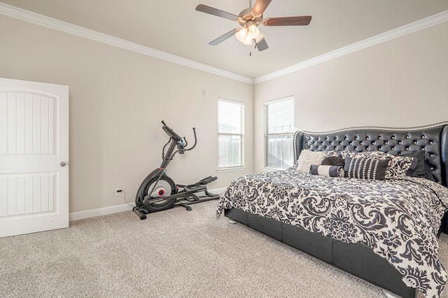 bedroom with carpet, ceiling fan, and crown molding