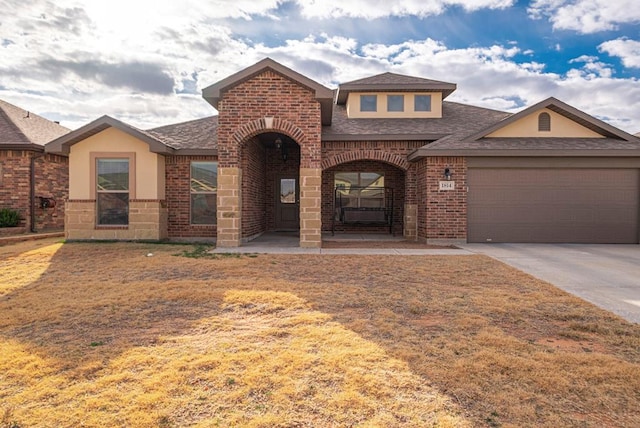 view of front of property with a garage