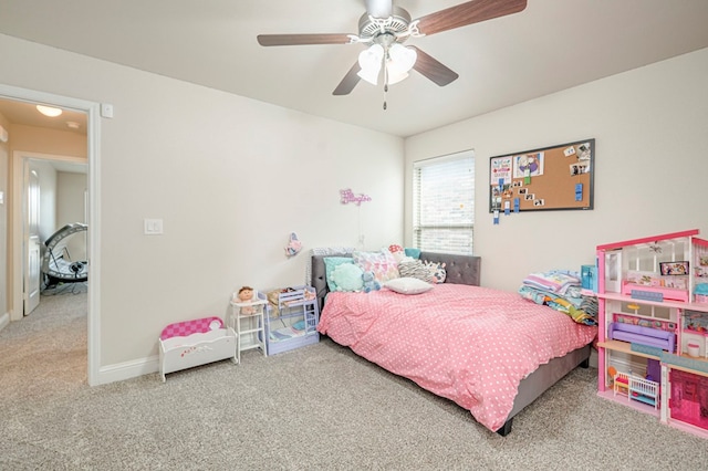 bedroom featuring carpet, a ceiling fan, and baseboards