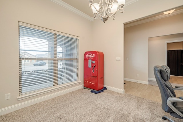 home office featuring an inviting chandelier, light colored carpet, crown molding, and baseboards