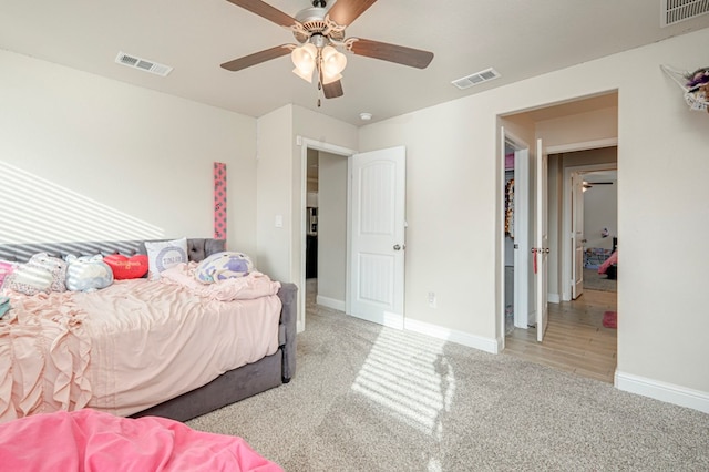 bedroom with visible vents, baseboards, and carpet floors