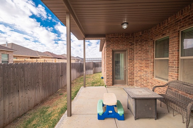 view of patio featuring a fenced backyard