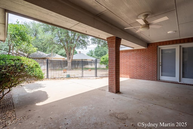 view of patio / terrace featuring a ceiling fan and fence