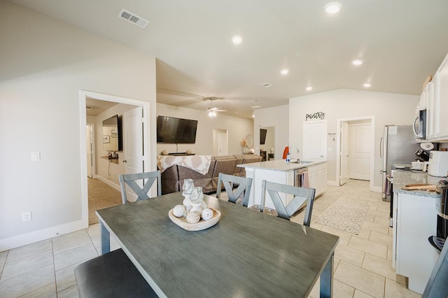 2623 E Ranch Ave, Midland, TX 79705 - dining space with a ceiling fan, light tile patterned floors, recessed lighting, and lofted ceiling