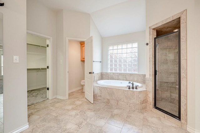 bathroom with plus walk in shower, toilet, and vaulted ceiling