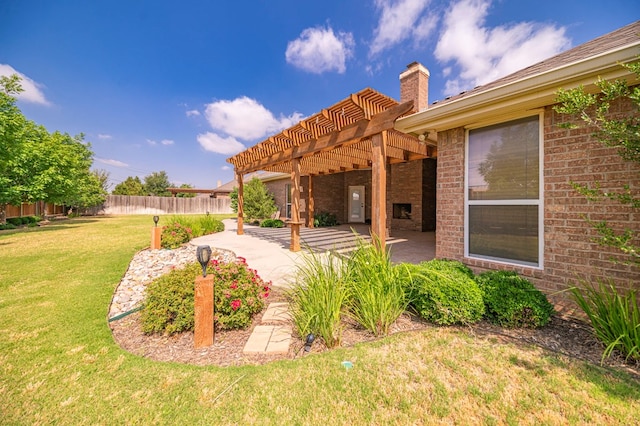 view of yard with a patio area and a pergola