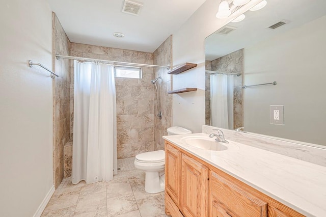 bathroom featuring toilet, a shower with curtain, and vanity