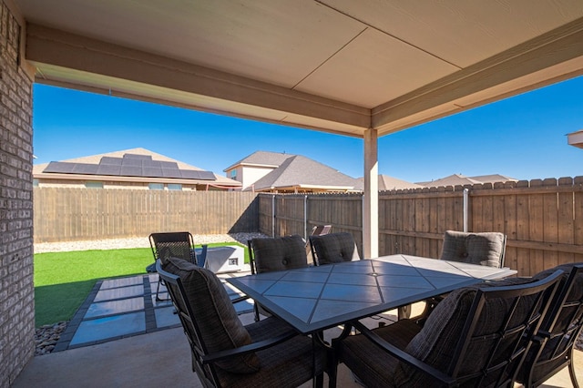 view of patio / terrace featuring a fenced backyard and outdoor dining space