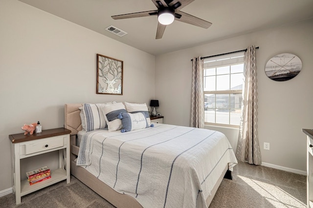 bedroom featuring ceiling fan, carpet, visible vents, and baseboards