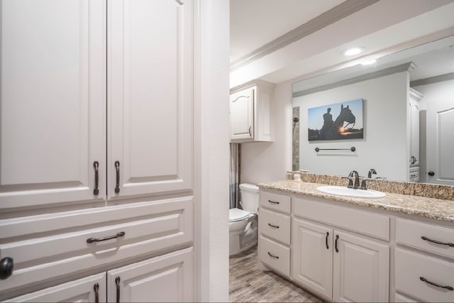 4402 Guadalupe St, Midland, TX 79707 - bathroom with vanity and wood finished floors