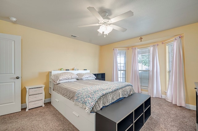 508 E Comiskey, Midland, TX 79706 - carpeted bedroom featuring ceiling fan and baseboards