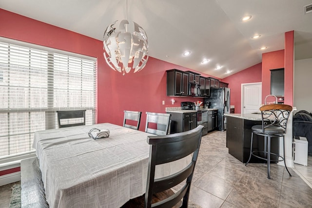 508 E Comiskey, Midland, TX 79706 - dining area with healthy amount of natural light, a chandelier, lofted ceiling, and recessed lighting