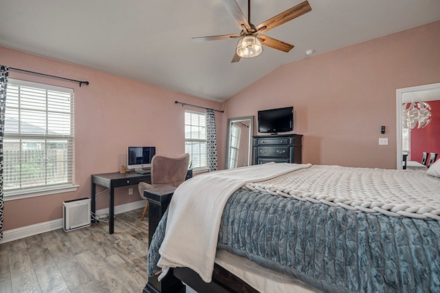 508 E Comiskey, Midland, TX 79706 - bedroom with wood finished floors, vaulted ceiling, baseboards, a ceiling fan, and an office area