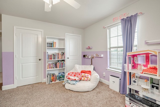 508 E Comiskey, Midland, TX 79706 - rec room with plenty of natural light, carpet, baseboards, and a ceiling fan