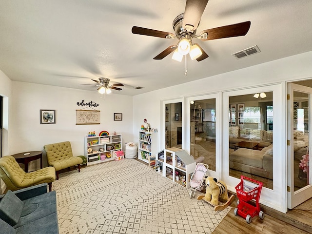 1303 Terra Ct, Midland, TX 79705 - living room featuring a ceiling fan and wood finished floors