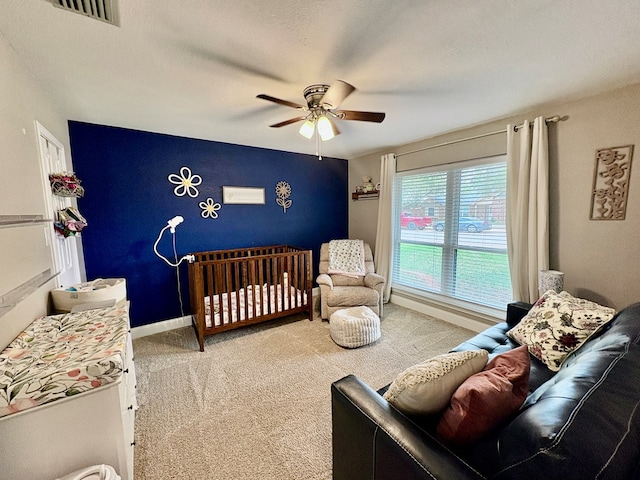 1303 Terra Ct, Midland, TX 79705 - carpeted bedroom featuring a ceiling fan and baseboards
