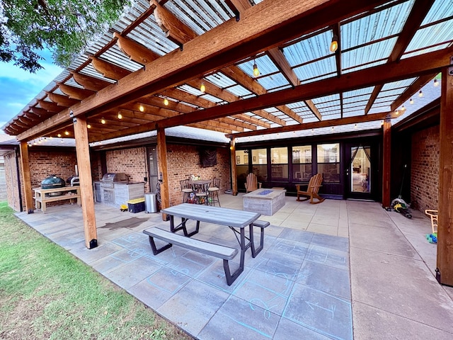 1303 Terra Ct, Midland, TX 79705 - view of patio / terrace featuring an outdoor kitchen and a pergola