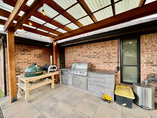 1303 Terra Ct, Midland, TX 79705 - view of patio / terrace with an outdoor kitchen and a pergola
