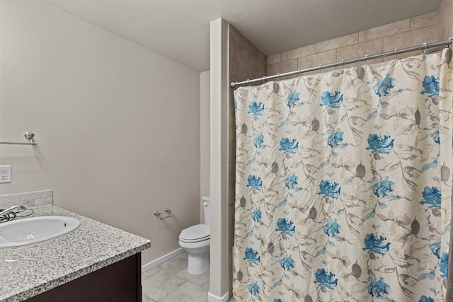 bathroom featuring tile patterned floors, a shower with curtain, vanity, a textured ceiling, and toilet