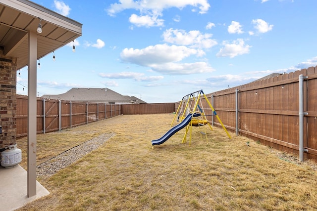 view of yard with a playground