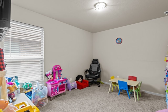 playroom featuring carpet floors